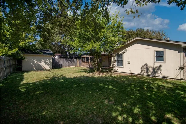 a house view with a garden space