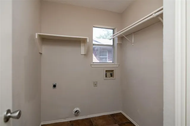 a view of a room with rack on the wall