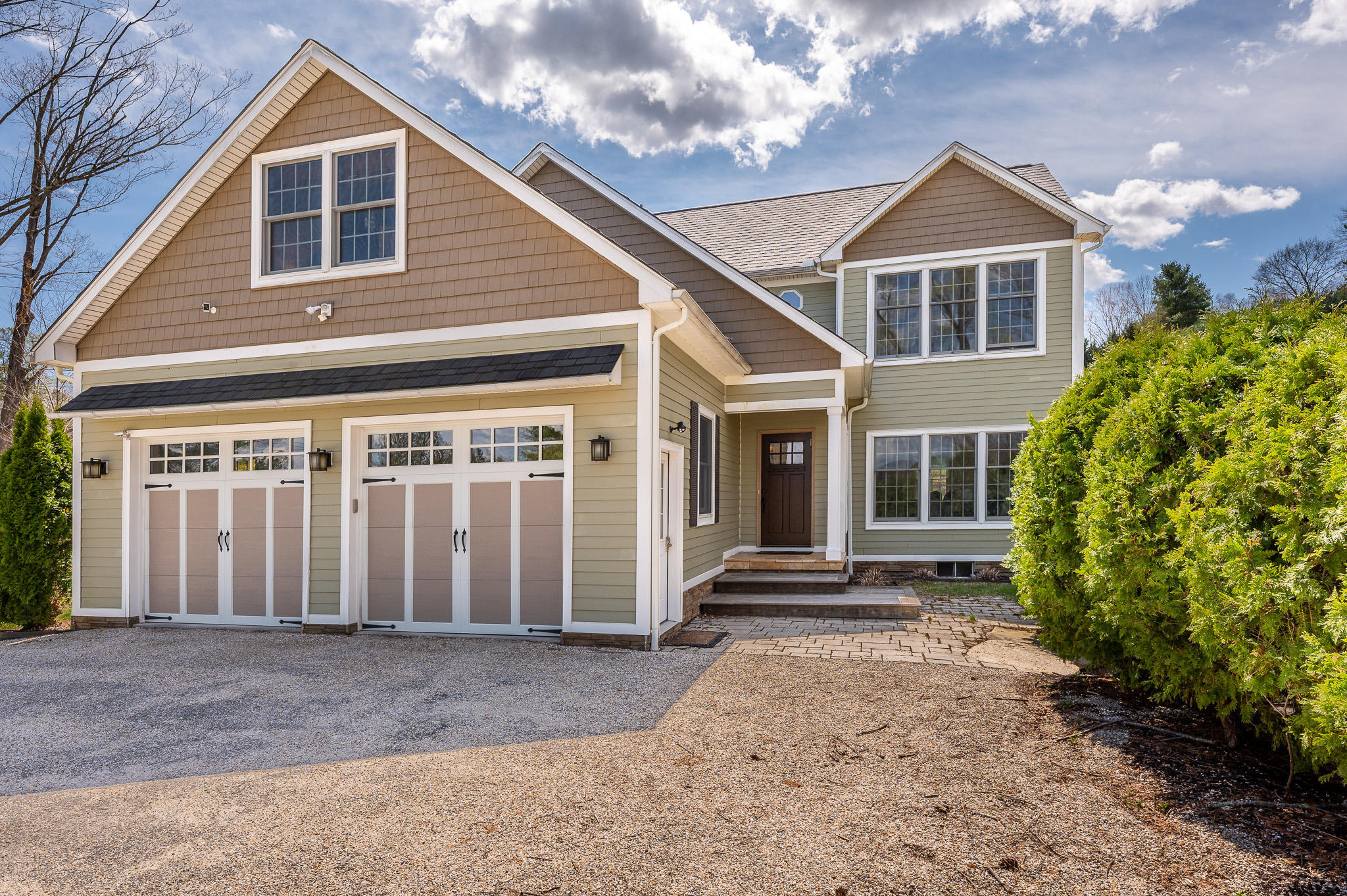8 Castle Hill Road Stockbridge, MA 01262 - Photo 2 of 46 a front view of a house with a yard