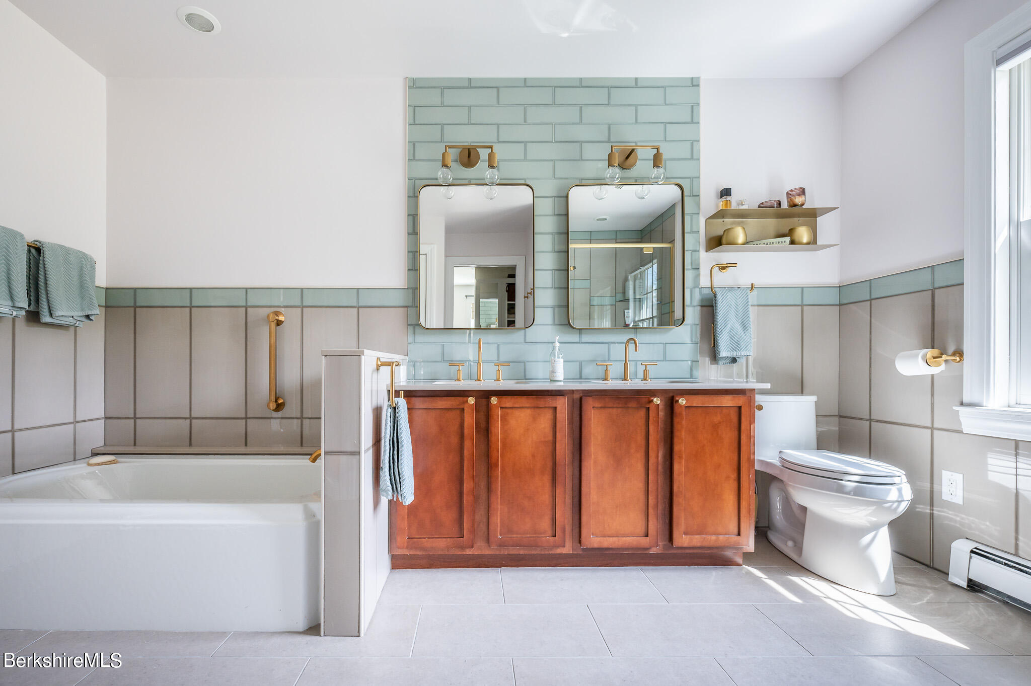 8 Castle Hill Road Stockbridge, MA 01262 - Photo 26 of 46 a bathroom with a granite countertop sink a toilet and bathtub