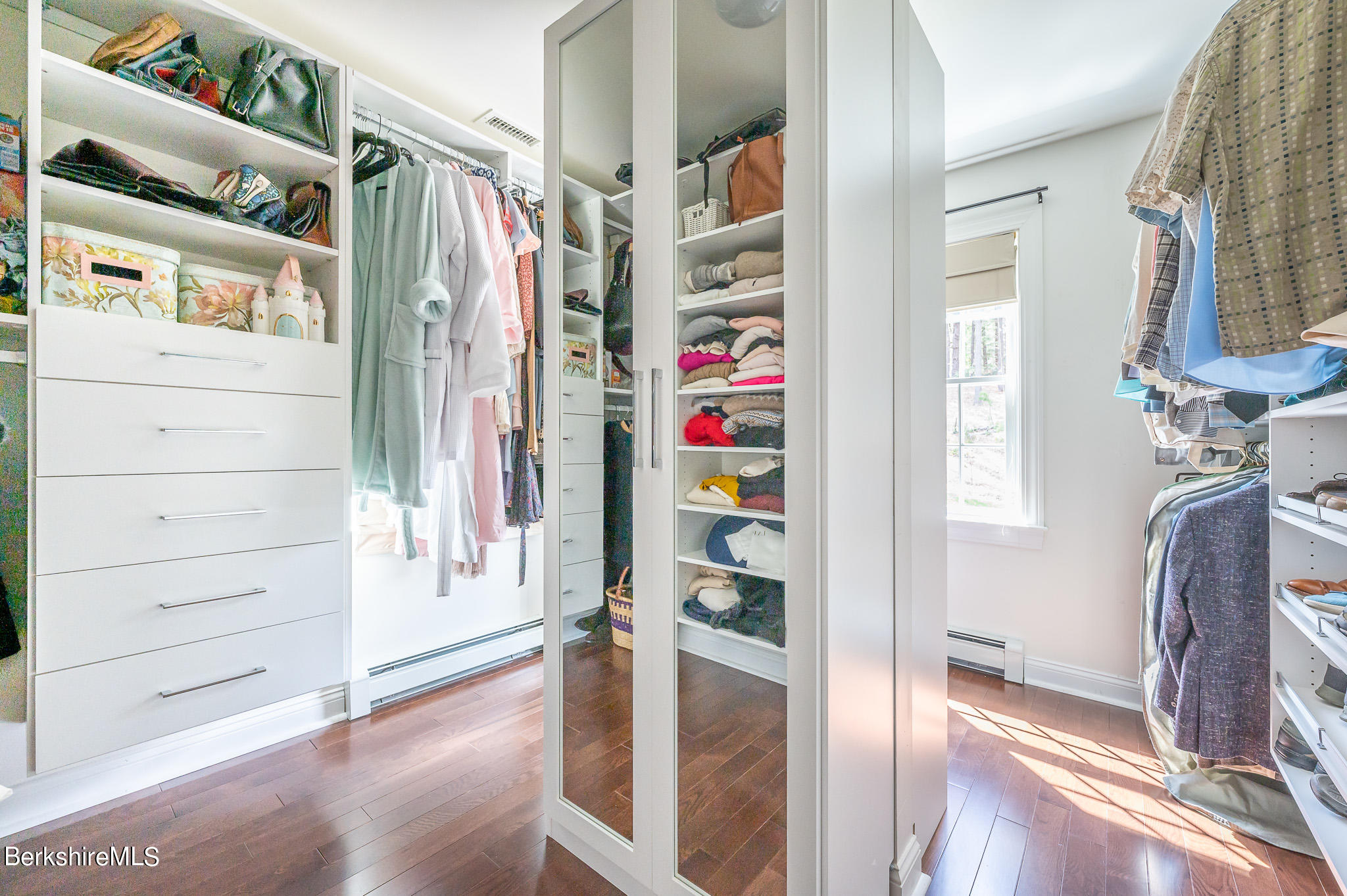 8 Castle Hill Road Stockbridge, MA 01262 - Photo 28 of 46 a view of walk in closet with clothes and shoes