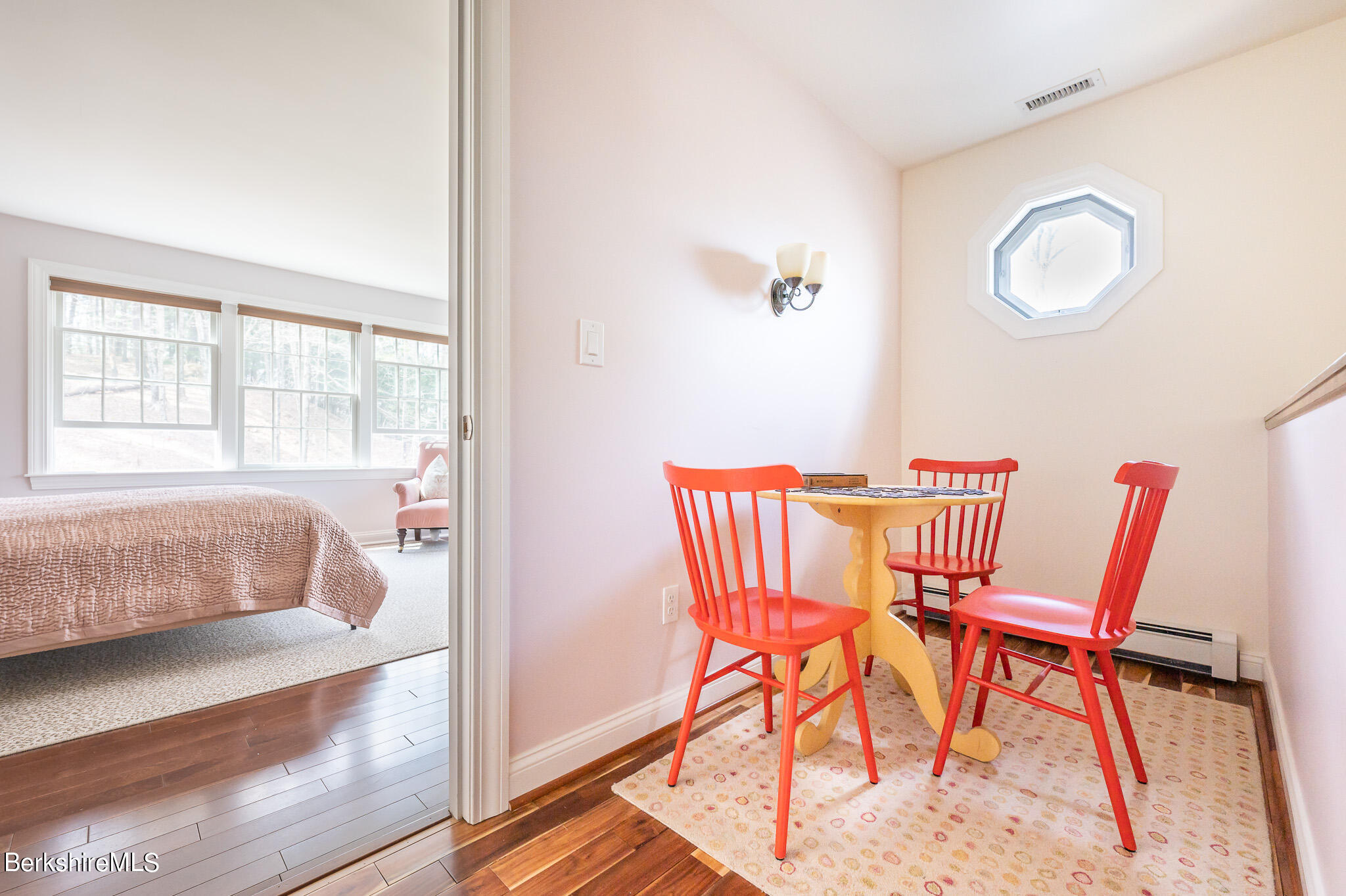 8 Castle Hill Road Stockbridge, MA 01262 - Photo 30 of 46 a bedroom with a bed and wooden floor