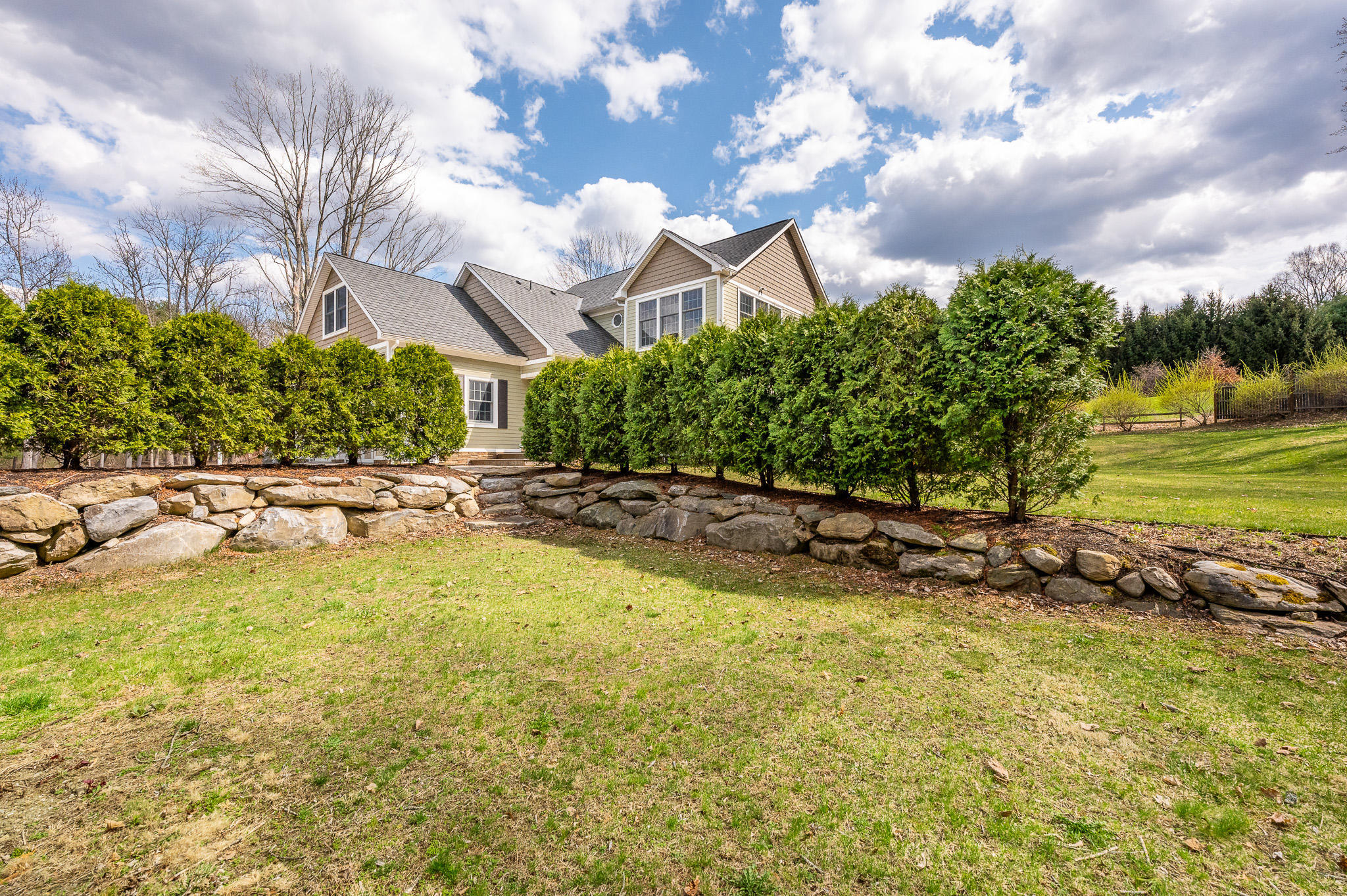 8 Castle Hill Road Stockbridge, MA 01262 - Photo 4 of 46 a view of a swimming pool with an outdoor space and seating area