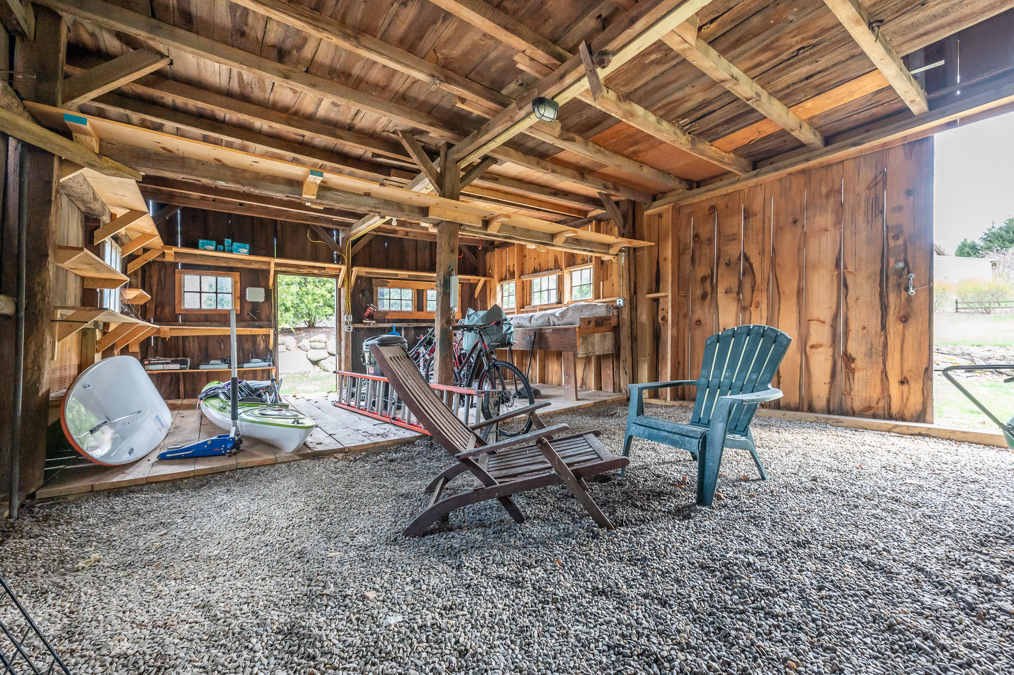 8 Castle Hill Road Stockbridge, MA 01262 - Photo 39 of 46 a view of a room with wooden floor and outdoor seating