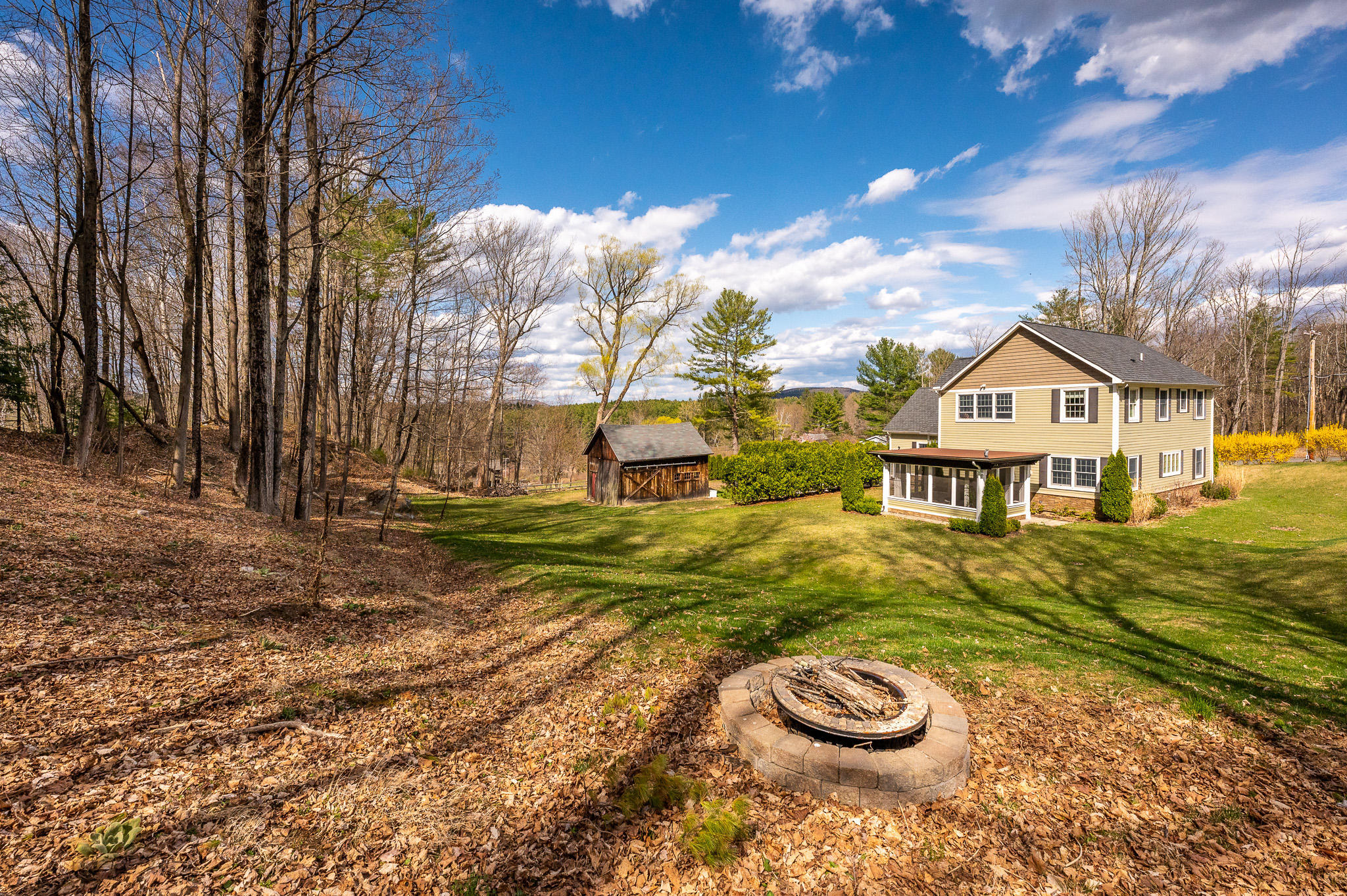 8 Castle Hill Road Stockbridge, MA 01262 - Photo 5 of 46 a view of a house with a yard