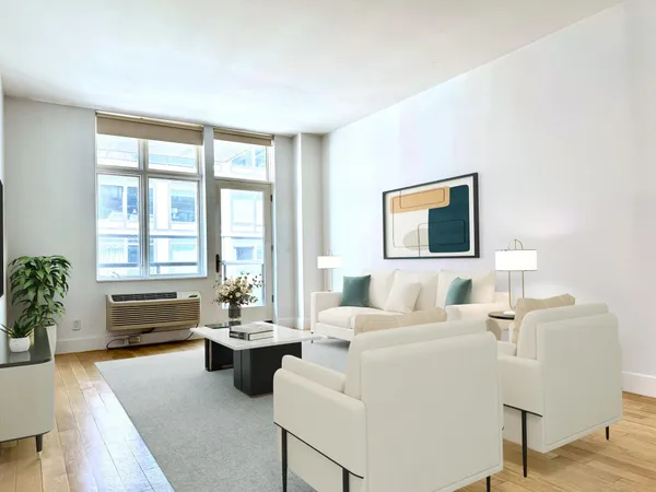 a living room with furniture large window and flat screen tv
