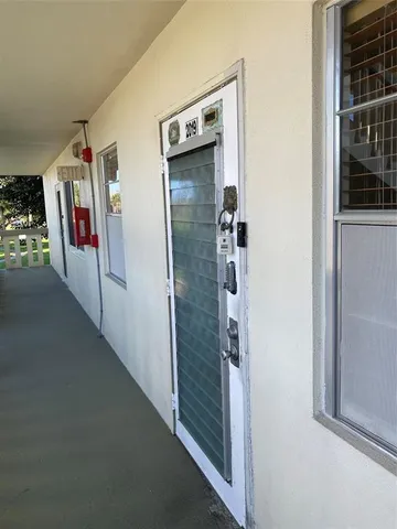 a view of swimming pool with a yard and outdoor seating