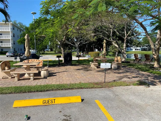 a view of a lake in a garden