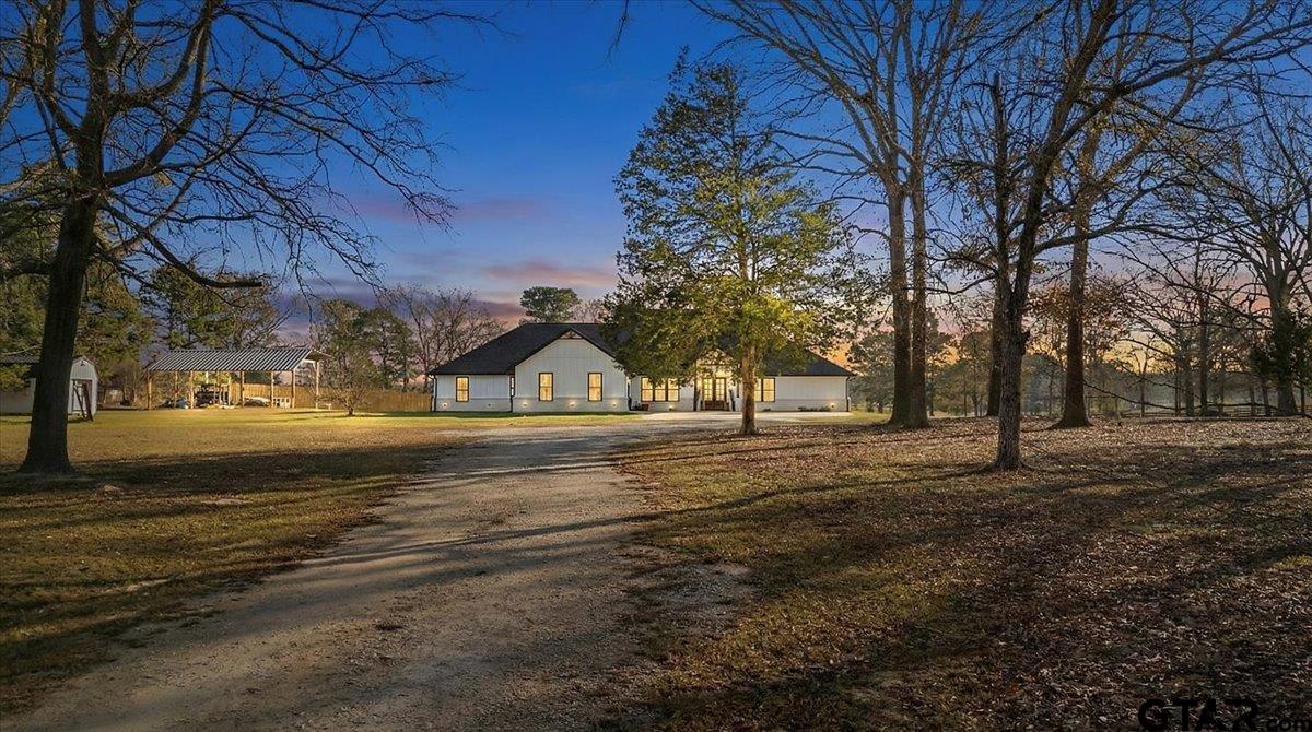 2680 Primera Road Tyler, TX 75705 - Photo 1 of 47 a view of yard with tree in front of it