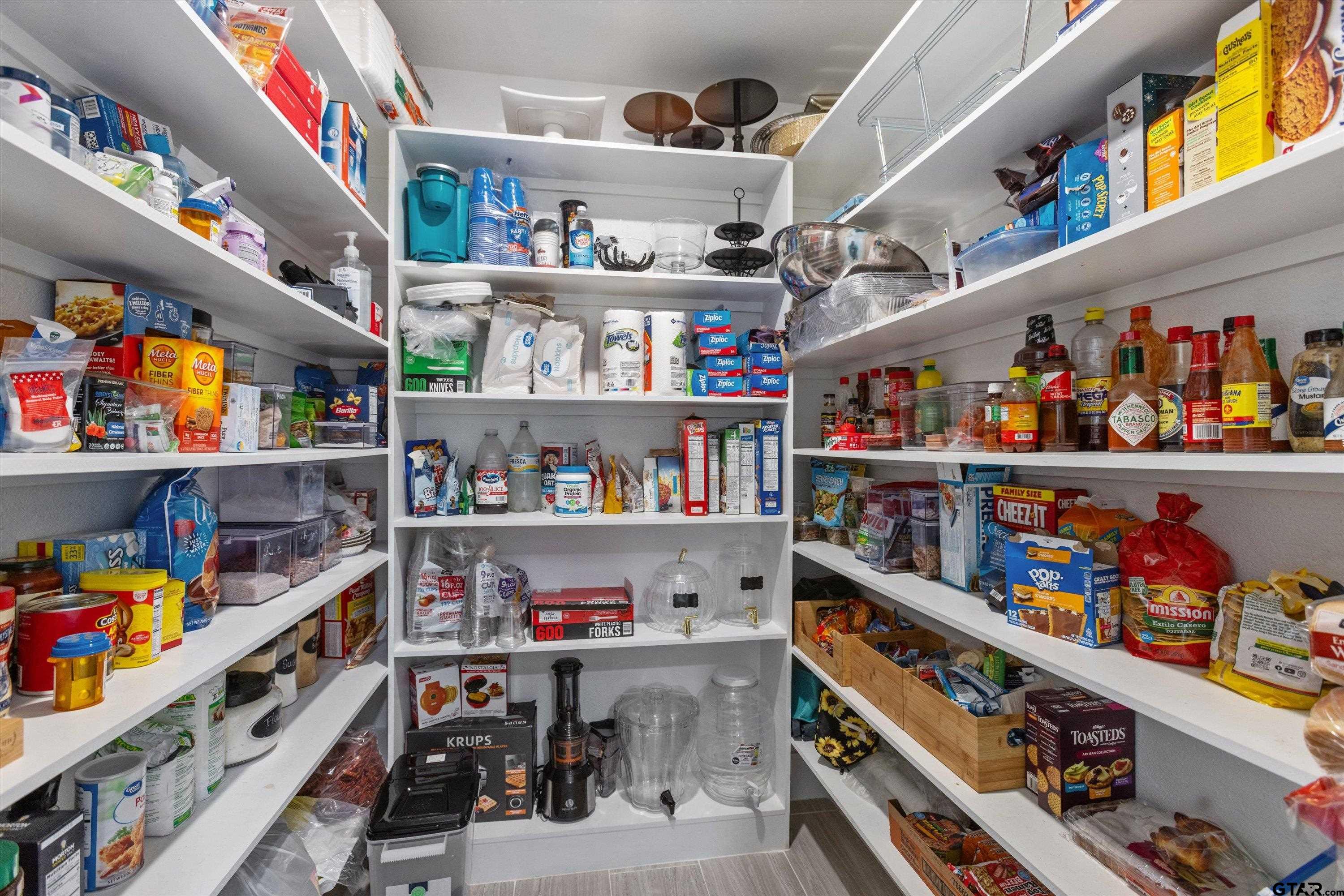 2680 Primera Road Tyler, TX 75705 - Photo 11 of 47 a view of storage and utility room with lots of baby toys