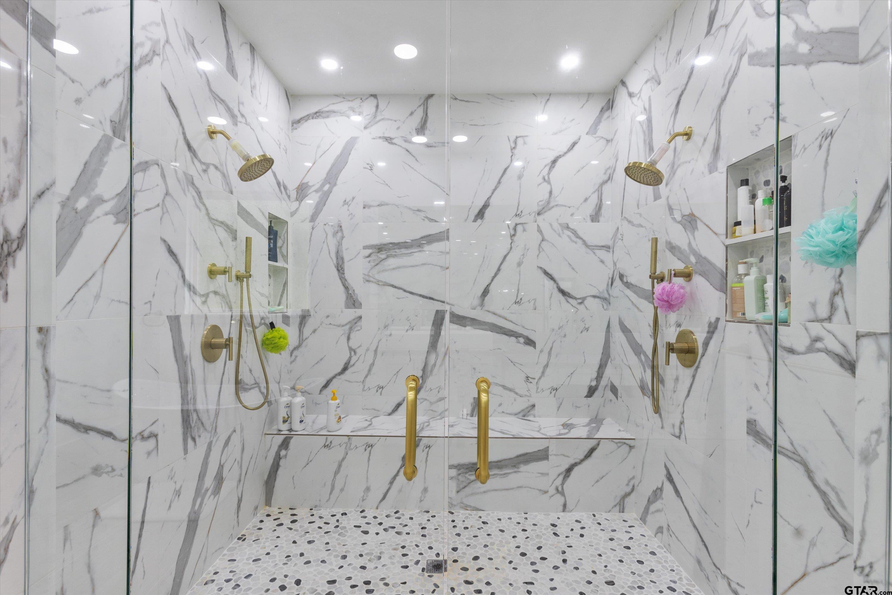 2680 Primera Road Tyler, TX 75705 - Photo 15 of 47 a bathroom with mirror and shower