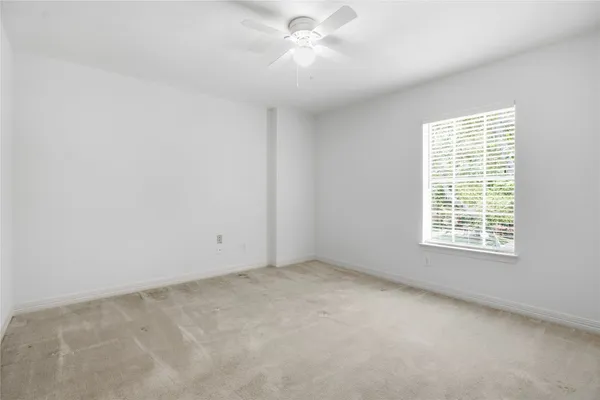 a swimming pool with outdoor seating and yard