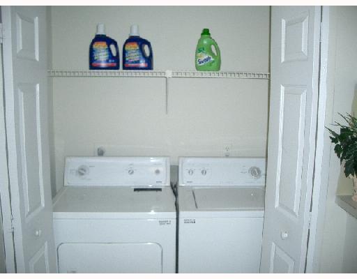 4341 West McNab Road, Unit 29 Pompano Beach, FL 33069 - Photo 7 of 10 a utility room with dryer and washer