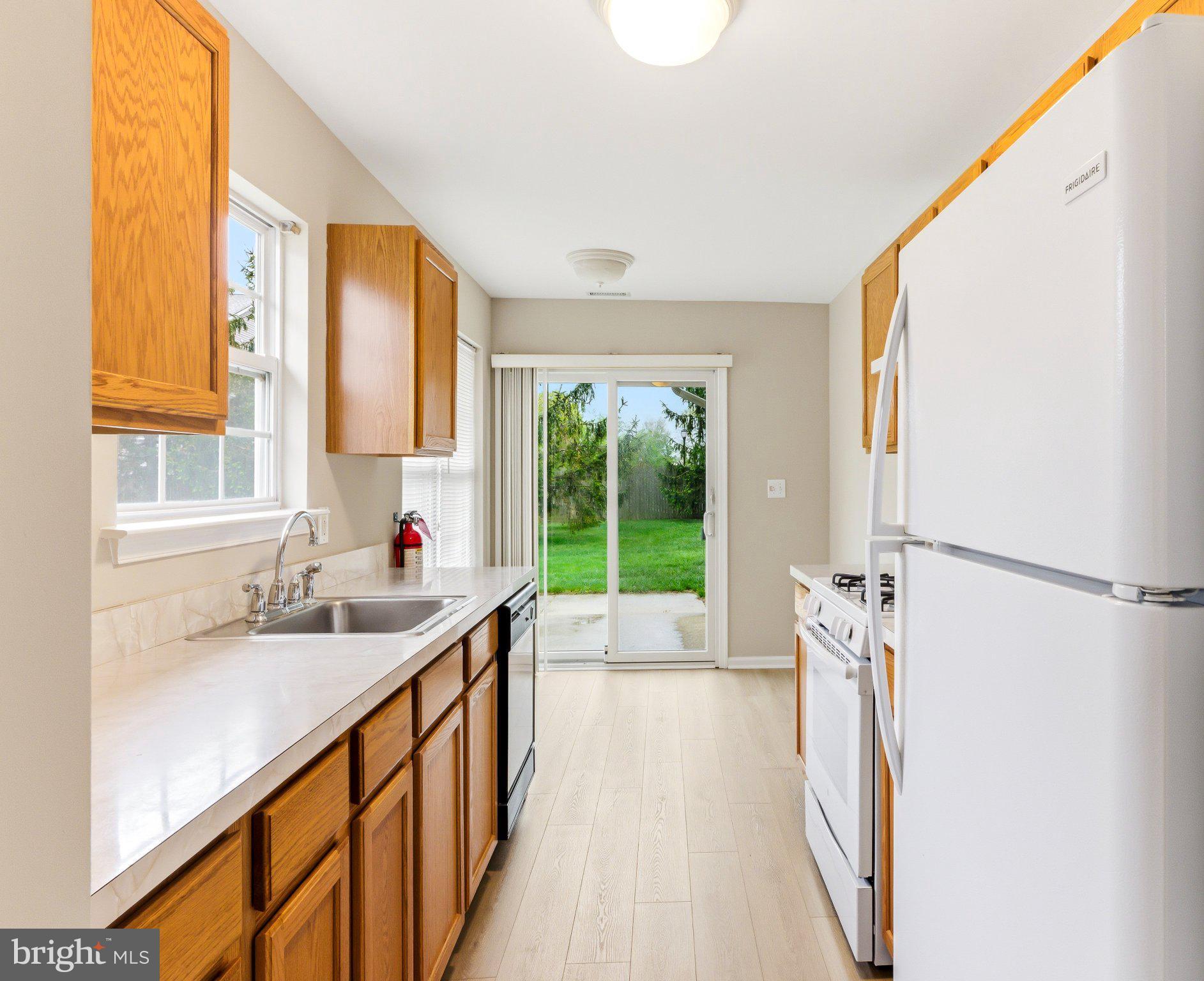 144 Alexander Road Beverly, NJ 08010 - Photo 11 of 23 Bright kitchen with outdoor views.