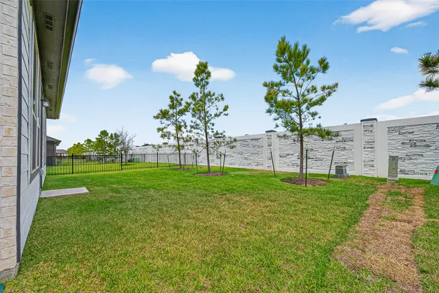 a view of a garden with a building