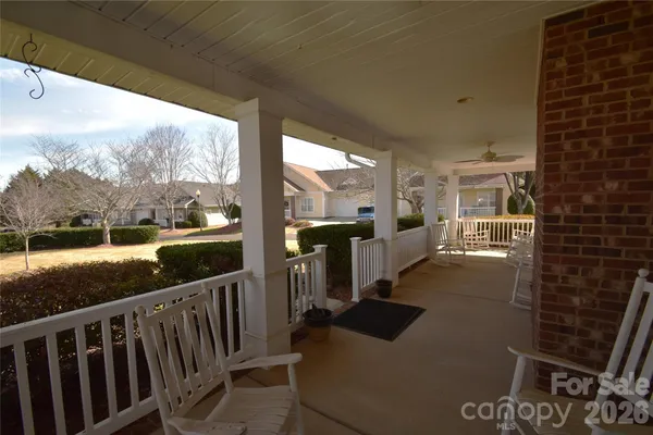 a view of a porch with furniture