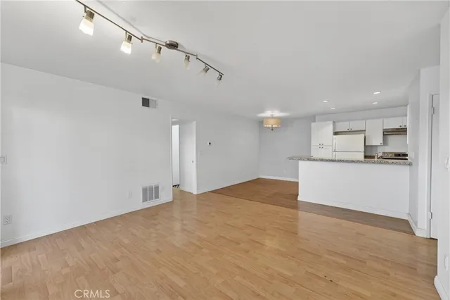 a view of a kitchen with marble kitchen and sink