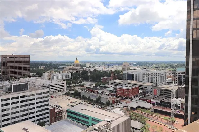 a view of a street with cars