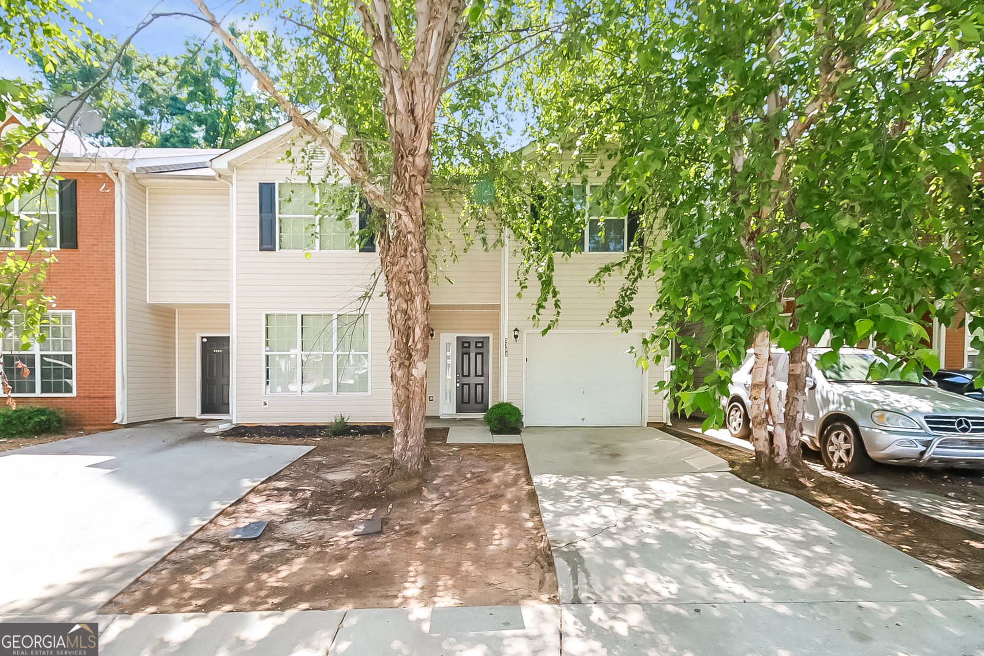 2353 Brianna Drive Hampton, GA 30228 - Photo 1 of 1 a view of a car park in front of a house