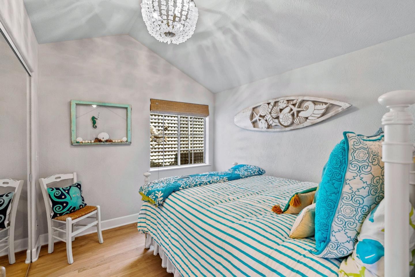 4940 Capitola Road Capitola, CA 95010 - Photo 12 of 25 a bedroom with a bed and a table in it