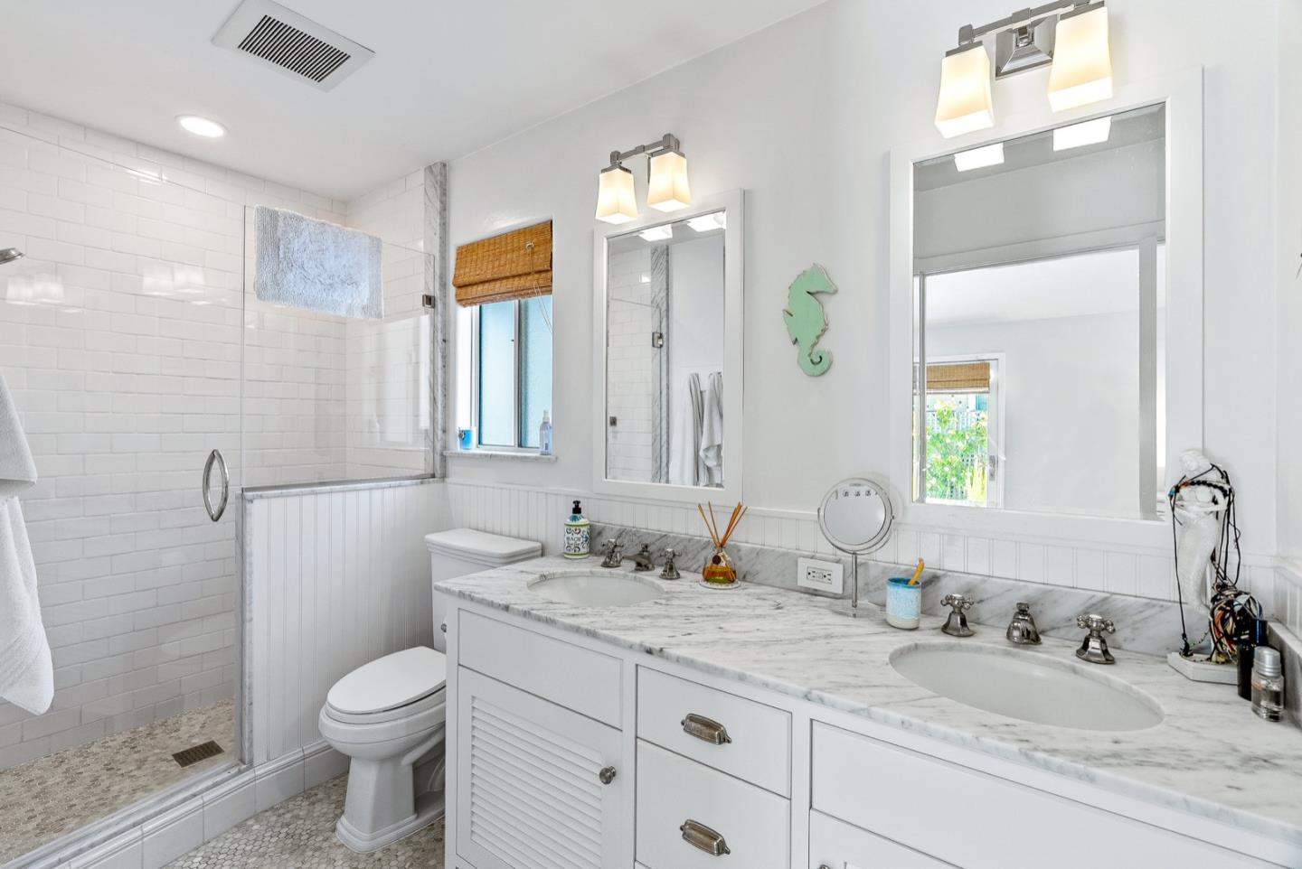 4940 Capitola Road Capitola, CA 95010 - Photo 14 of 25 a bathroom with a granite countertop sink toilet and shower
