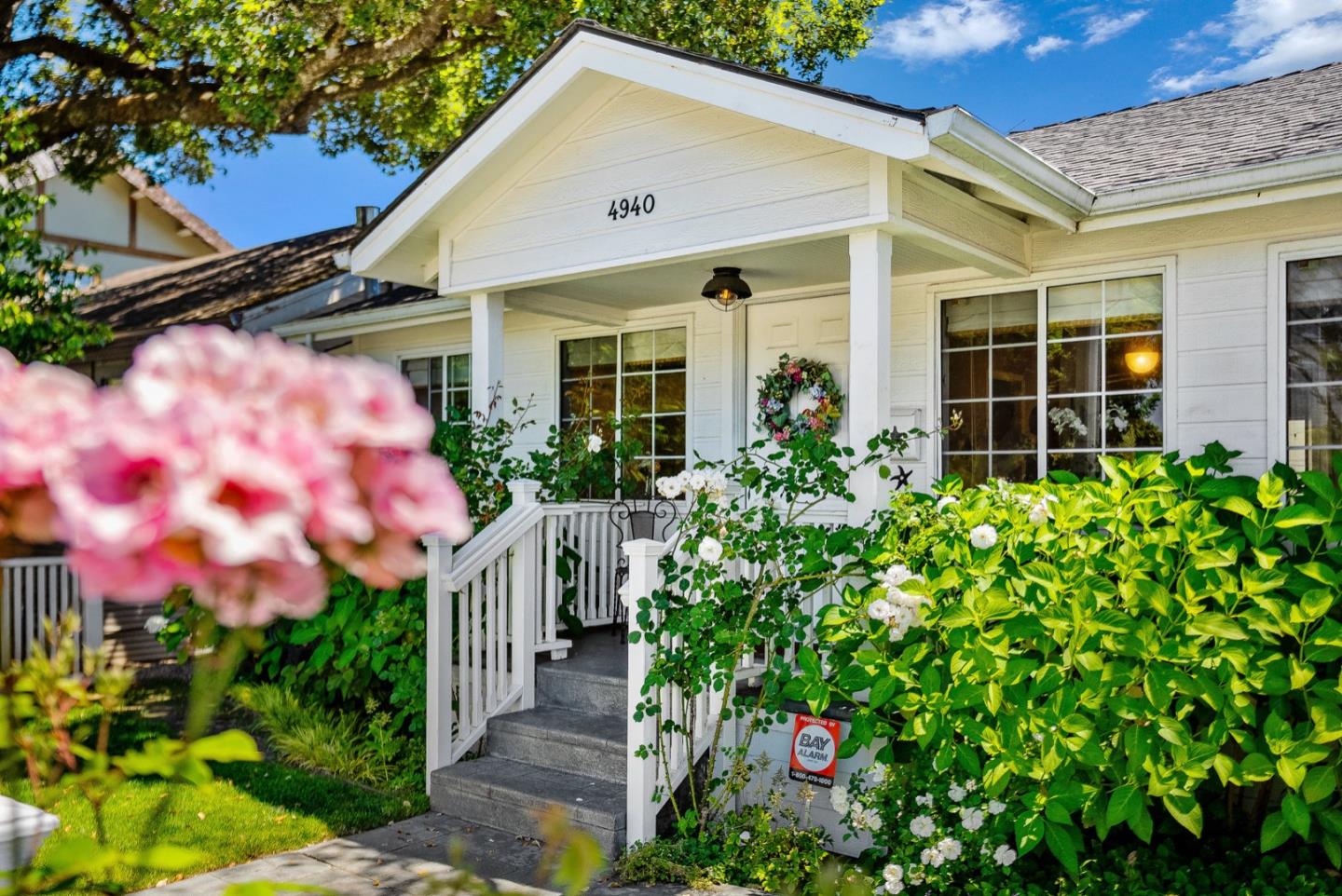 4940 Capitola Road Capitola, CA 95010 - Photo 2 of 25 a front view of a house with a yard