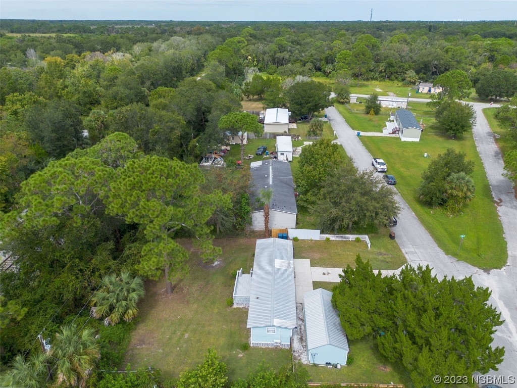 153 West Loop Oak Hill, FL 32759 - Photo 26 of 32 an aerial view of residential houses with outdoor space and river