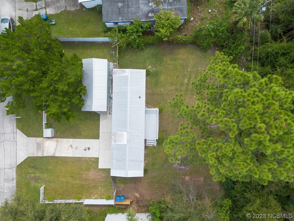 153 West Loop Oak Hill, FL 32759 - Photo 32 of 32 an aerial view of a house with a yard basket ball court and outdoor seating