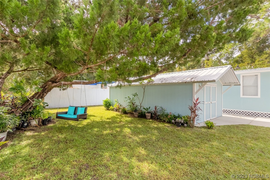 153 West Loop Oak Hill, FL 32759 - Photo 4 of 32 an outdoor space with garden view