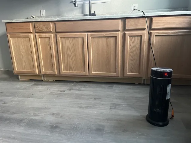 a view of door with wooden walls