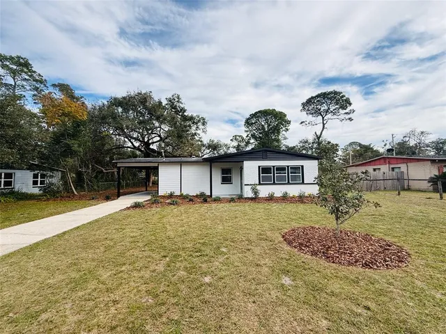 a house view with a garden space