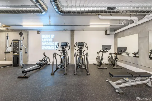 a view of a room with gym equipment