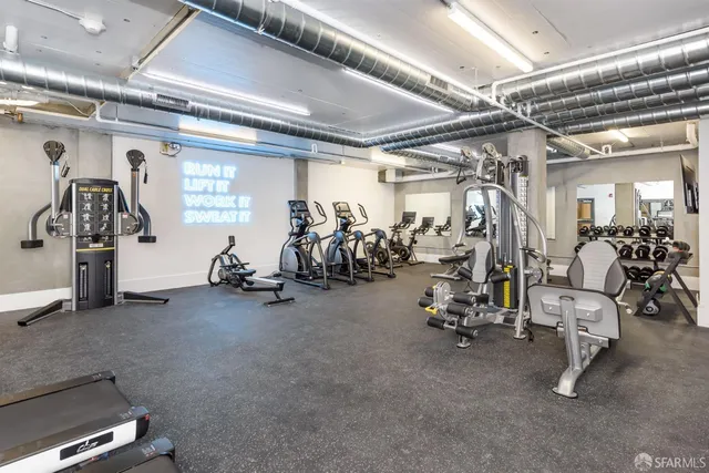 a view of a room with gym equipment