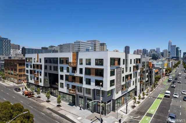 a view of a building with a street