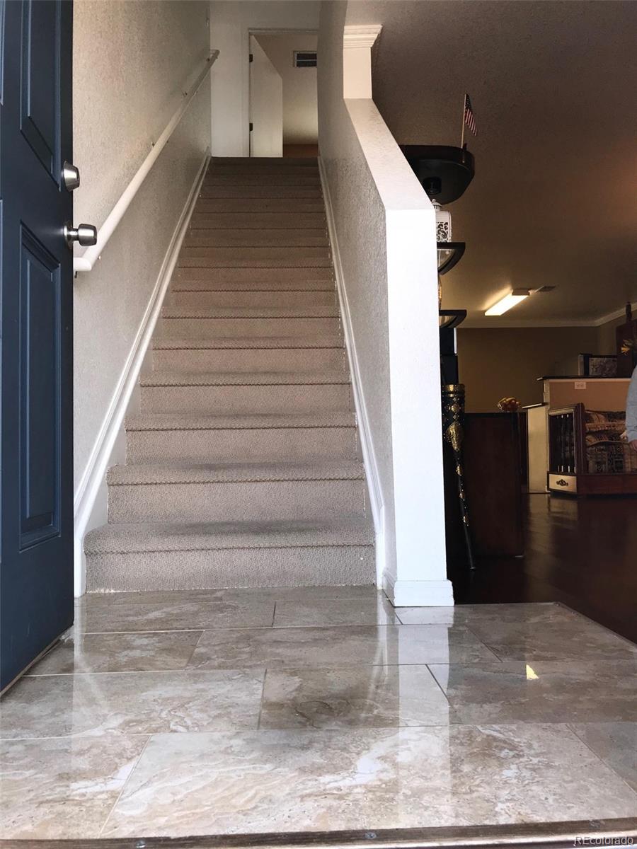 5556 Flanders Way Denver, CO 80249 - Photo 14 of 23 a view of entryway