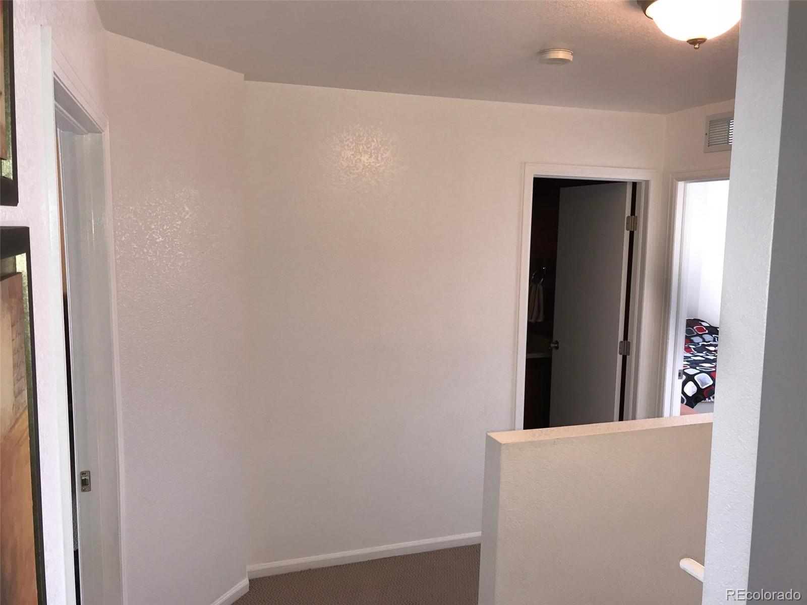 5556 Flanders Way Denver, CO 80249 - Photo 19 of 23 a view of an empty room