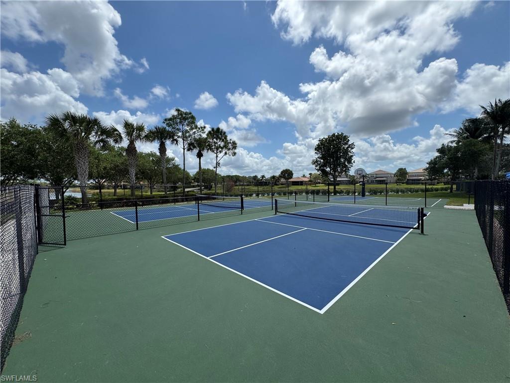 6606 Marbella Drive Naples, FL 34105 - Photo 6 of 11 a view of a tennis court