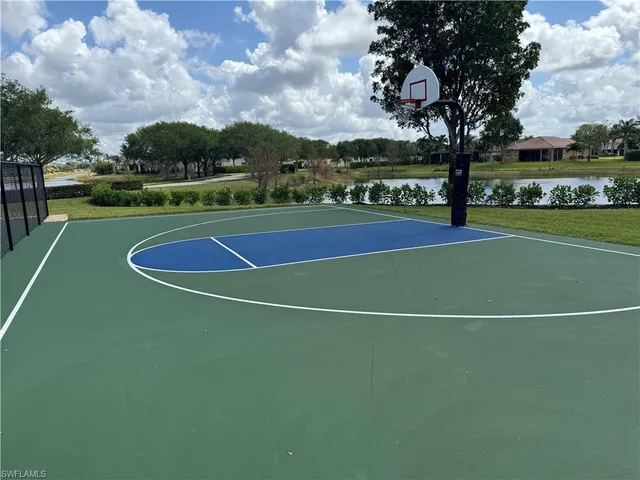 a view of an outdoor space and tennis court