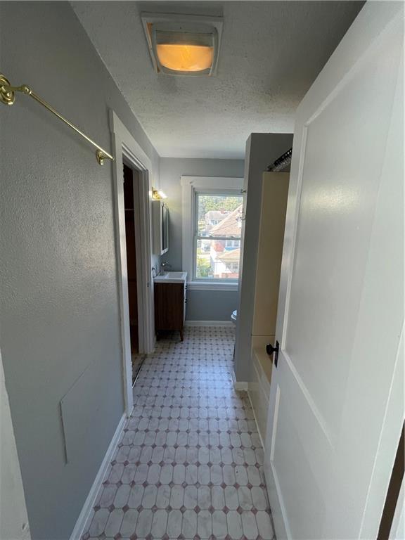 519 North Monroe Street Butler, PA 16001 - Photo 17 of 32 a bathroom with a sink and a mirror