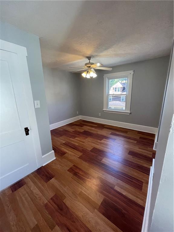 519 North Monroe Street Butler, PA 16001 - Photo 19 of 32 wooden floor in an empty room with a window
