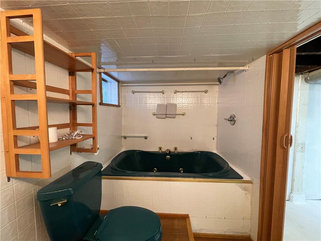 519 North Monroe Street Butler, PA 16001 - Photo 23 of 32 a bathroom with a sink and a shower