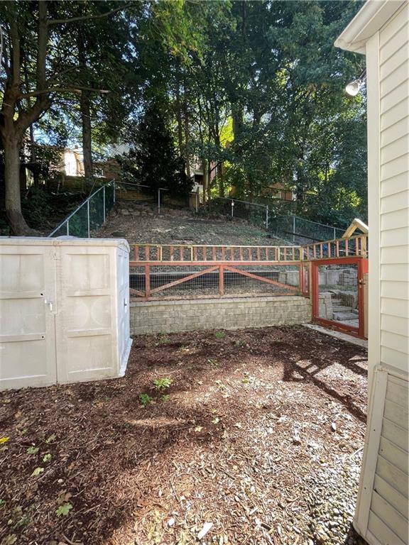 519 North Monroe Street Butler, PA 16001 - Photo 30 of 32 a backyard of a house with lots of green space