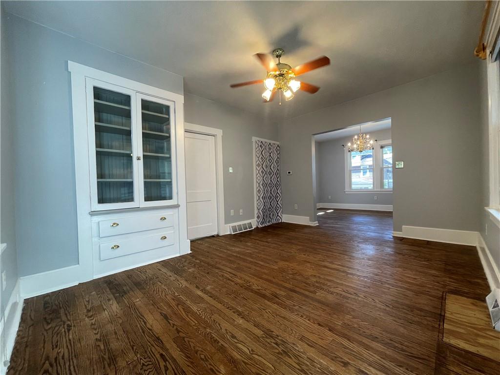 519 North Monroe Street Butler, PA 16001 - Photo 10 of 32 a view of an empty room with window and wooden floor