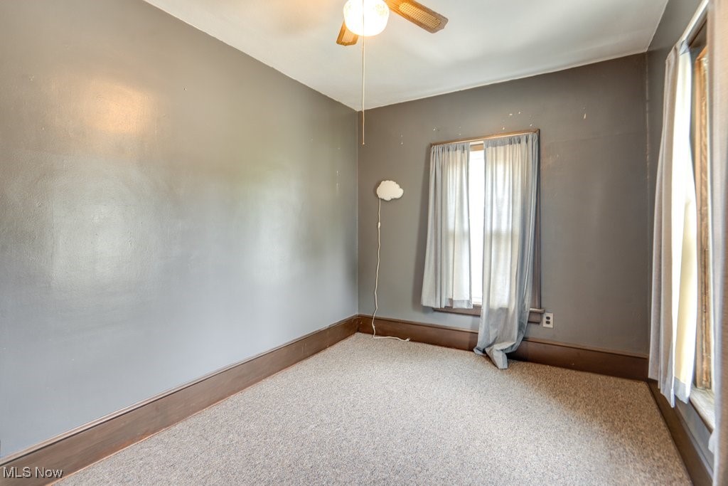 516 Floyd Street Akron, OH 44310 - Photo 31 of 50 Unfurnished bedroom featuring ceiling fan and carpet floors