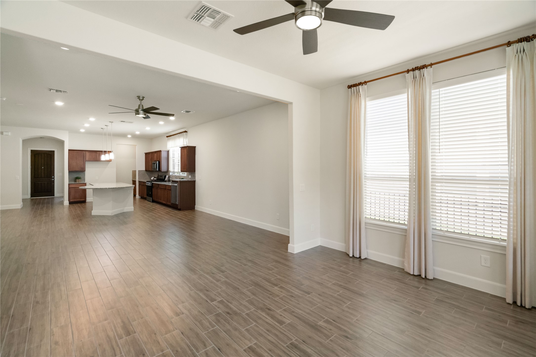 516 Nokota Drive Spring, TX 77382 - Photo 13 of 33 Subtle design separation between living space and sunroom.