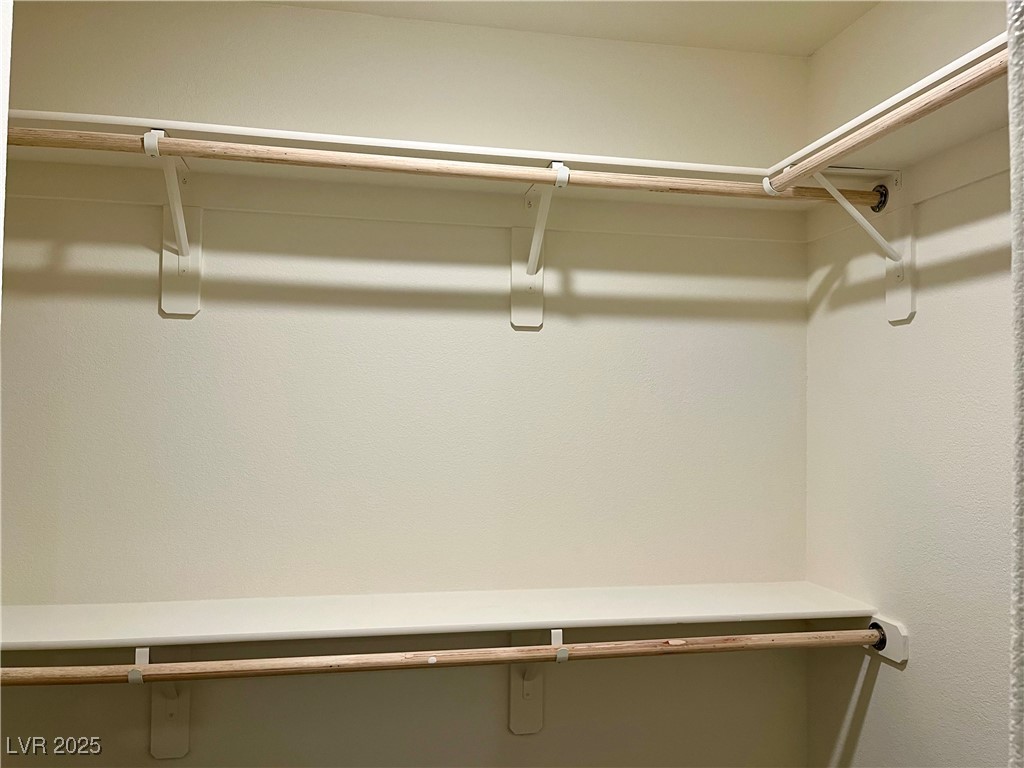 4862 Orchid Rdg Avenue Las Vegas, NV 89141 - Photo 26 of 48 Primary bedroom walk in closet.