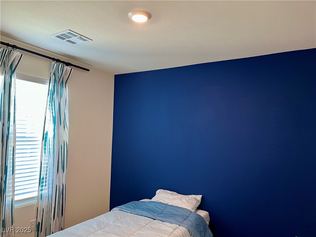 4862 Orchid Rdg Avenue Las Vegas, NV 89141 - Photo 31 of 48 Bed 3 w/ ceiling light, carpet, blinds & curtains.