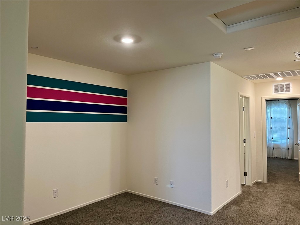4862 Orchid Rdg Avenue Las Vegas, NV 89141 - Photo 38 of 48 Loft w/ceiling light & carpet. Laundry closet w/washer & dryer and add'l linen closet.