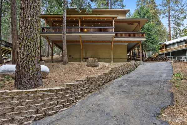 a view of a house with a sitting area