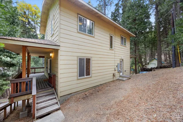 a view of balcony with wooden floor
